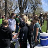 Students visiting booth during Tree Campus Arbor Day event 2026.